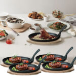 4er-Set Profi Servierpfanne aus Gusseisen mit Holz-Untersetzer, 24 x 14 x 2,2 cm 4er-Set Profi Servierpfanne aus Gusseisen mit Holz-Untersetzer, 24 x 14 x 2,2 cm