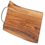 Olivenholzbrett mit Messinggriff, Apérobrättli, 22 x 15 x 2,4 cm Olivenholzbrett mit Messinggriff, Apérobrättli, 22 x 15 x 2,4 cm