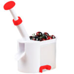 Kirschenentsteiner mit Schlagstempel und Auffangbehälter