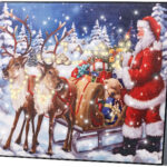 LED-Bild „Weihnachtsmann mit Rentierschlitten“, 28 x 23 cm